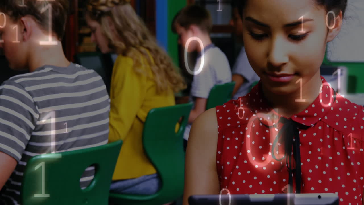 숫자가 움직이는 동안 태블릿에서 타이핑하는 학생