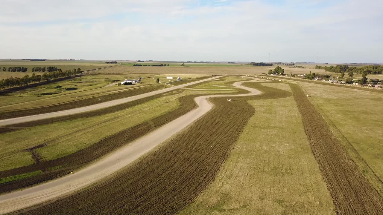 Empty Car Race Circuit in middle of a field