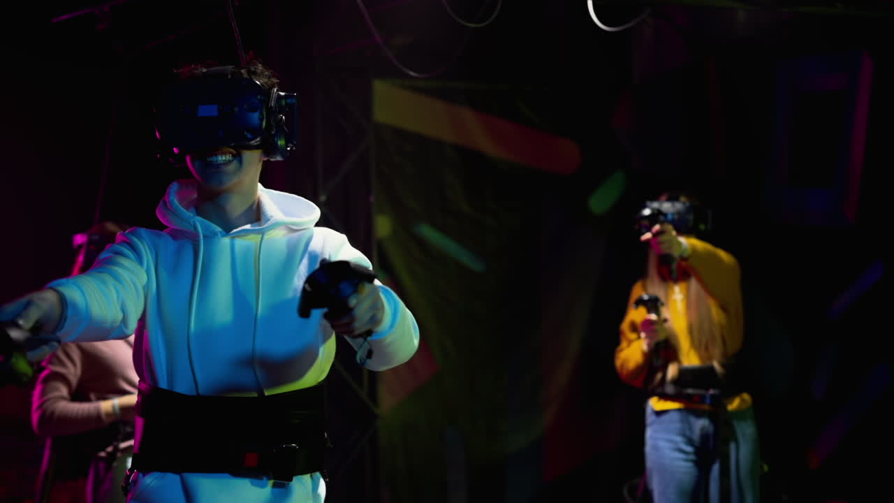 Teenagers playing with a Virtual Reality headset in a studio