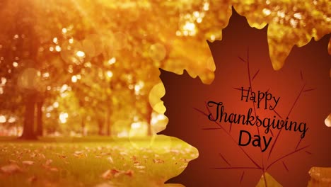 animación del texto de acción de gracias en una hoja sobre un paisaje de otoño