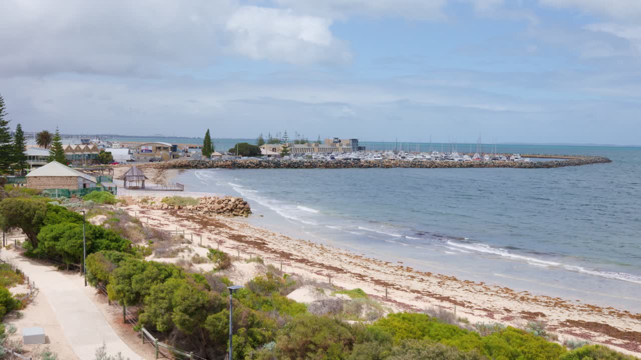 This 4K footage captures a serene daytime view of Bathers Bay Beach in Fremantle, Perth, Western Australia.