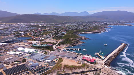 Drone-view-over-Hermanus-New-Harbour-and-coastline,-Overstrand,-Western-Cape