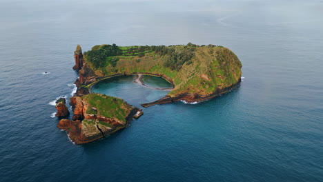 picturesque island atlantic ocean drone view. aerial breathtaking volcanic islet