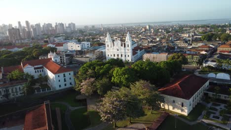 aerial orbital view, belem city metropolis, urban worship landmarks