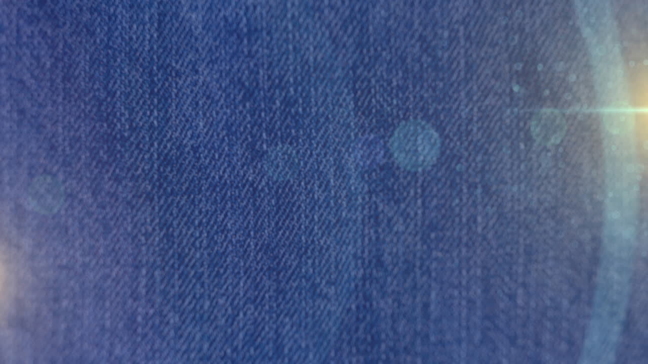 Animazione di punti luce su pantaloni di denim
