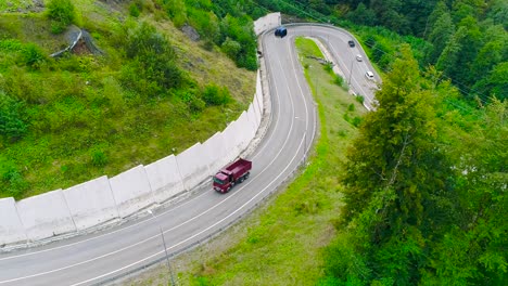 mountain road with truck and winding curves