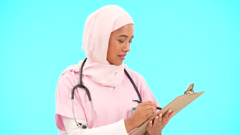 Woman,-doctor-and-writing-on-clipboard-in-studio