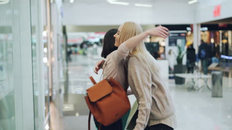 two women shopping at a mall