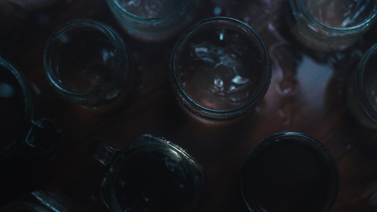 Water driping on glass jars