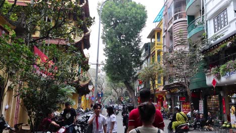 people walking on a busy, vibrant street