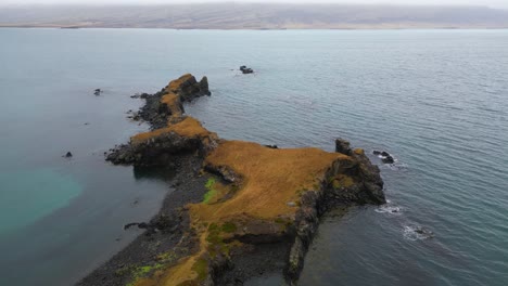 peninsula near djupovogur coast in iceland, aerial drone