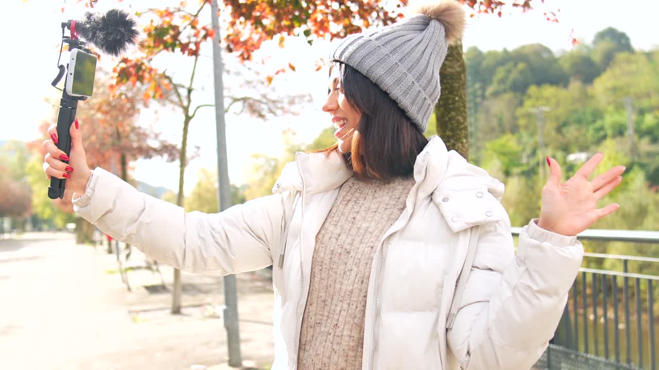 Woman Vlogging Outdoors in Autumn