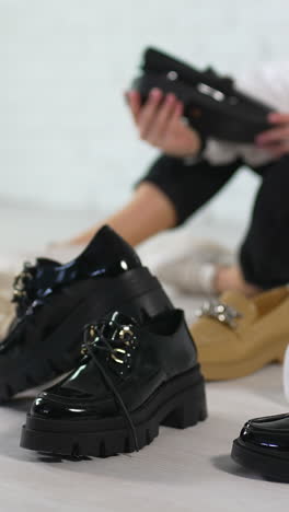 fashionable choosing female shoes. choosing styulish shoes. vertical video
