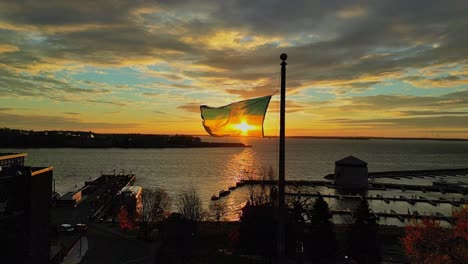 ukraine flag in slow motion during a sunrise on a flag pole