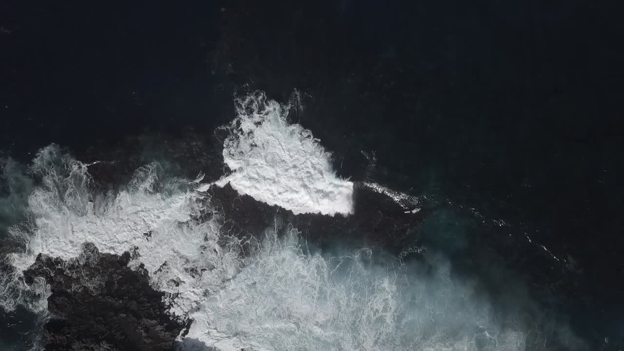 Amazing view of waves rolling on rocky shore