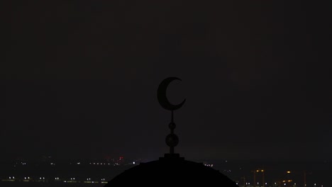 the islam symbol on a city with a lightning background