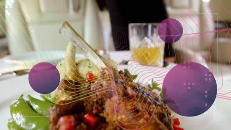 gourmet dish with pomegranate seeds plated artfully on geometric background