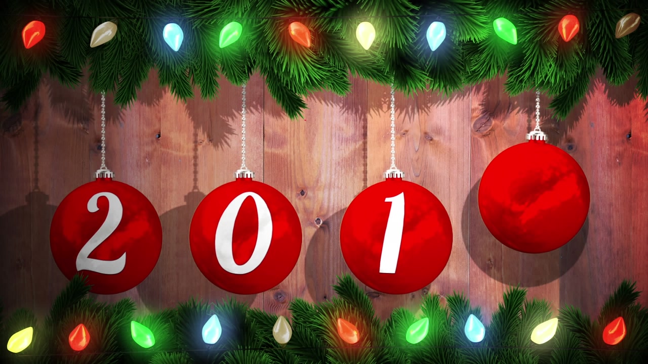 Animation of feliz navidad christmas greetings text over christmas fairy lights and red baubles 2015
