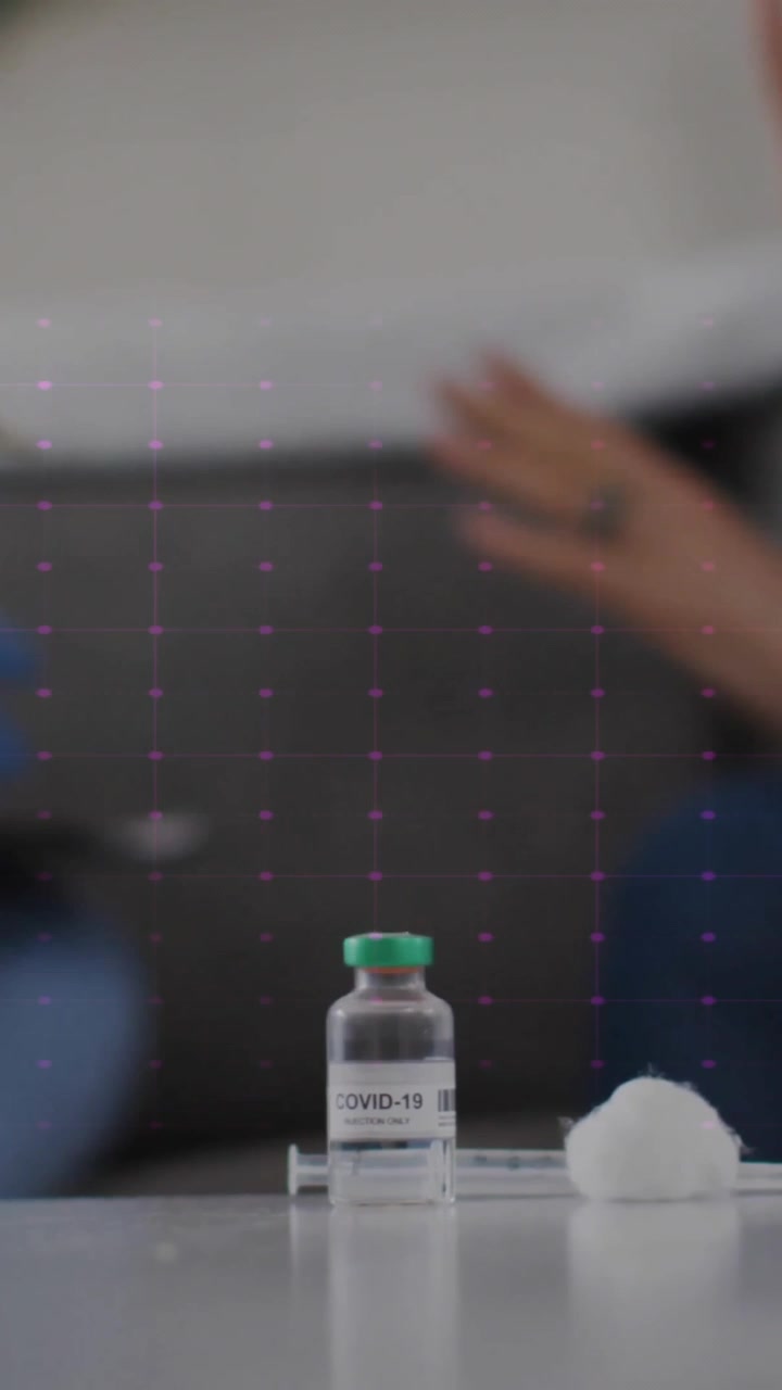 Animation of cardiograph over diverse doctor and patient