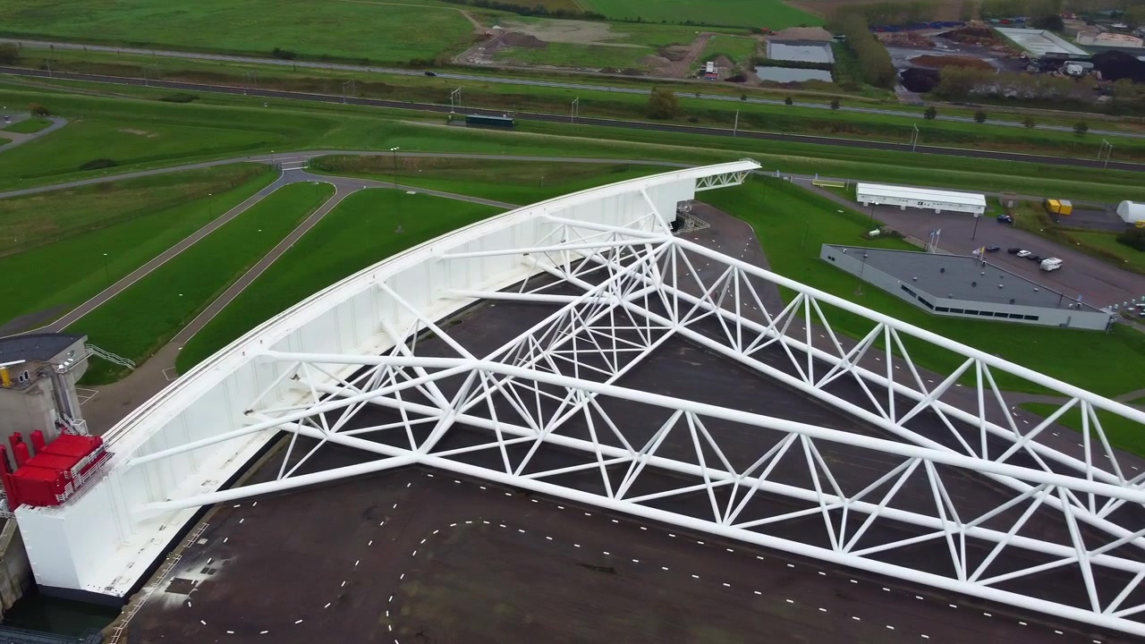 Maeslant Barrier (Maeslantkering), a movable storm surge barrier. Delta Works.Aerial view. Nieuwe Waterweg canal, entrance to the Port of Rotterdam, Netherlands.