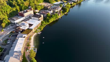 Aerial view and flight on the shore of Mirror Lake in the morning In Lake Placid, NY