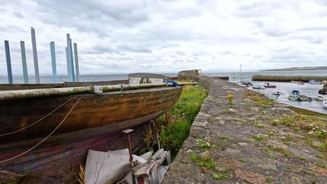 boats docked at dysart harbor in fife, scotland