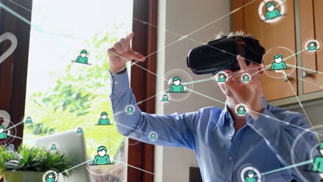 Animation-of-network-of-connections-with-people-icons-over-businessman-wearing-vr-headset