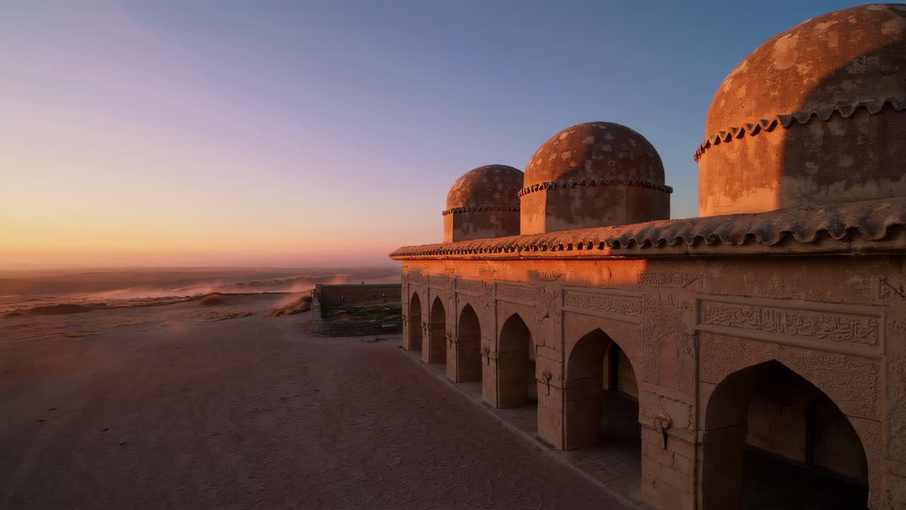Ancient Mosque at Sunrise in the Desert