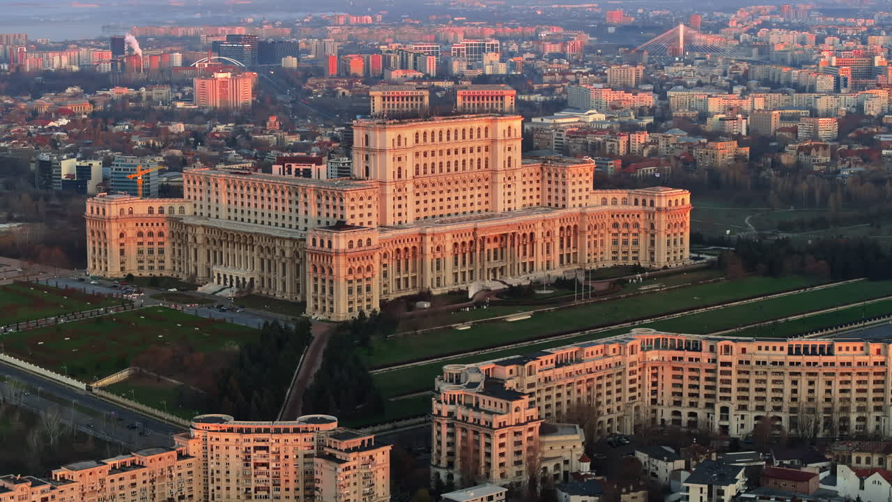 Aerial drone view of Palace of the Parliament in Bucharest downtown at sunset. Romania