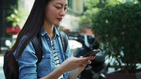 Handheld-view-of-young-woman-with-cell-phone