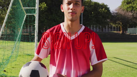 holding soccer ball, man with sign up! text overlay on school field animation