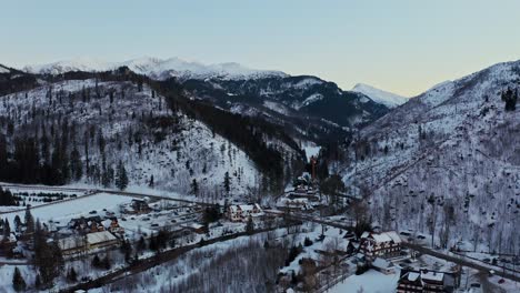 Taty-Mountains-Aerial-Drone-View-with-traditional-houses-and-village-in-winter