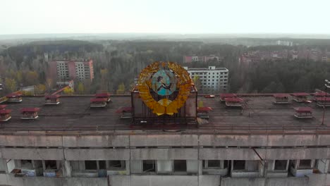 soviet coat of arms on a building in pripyat