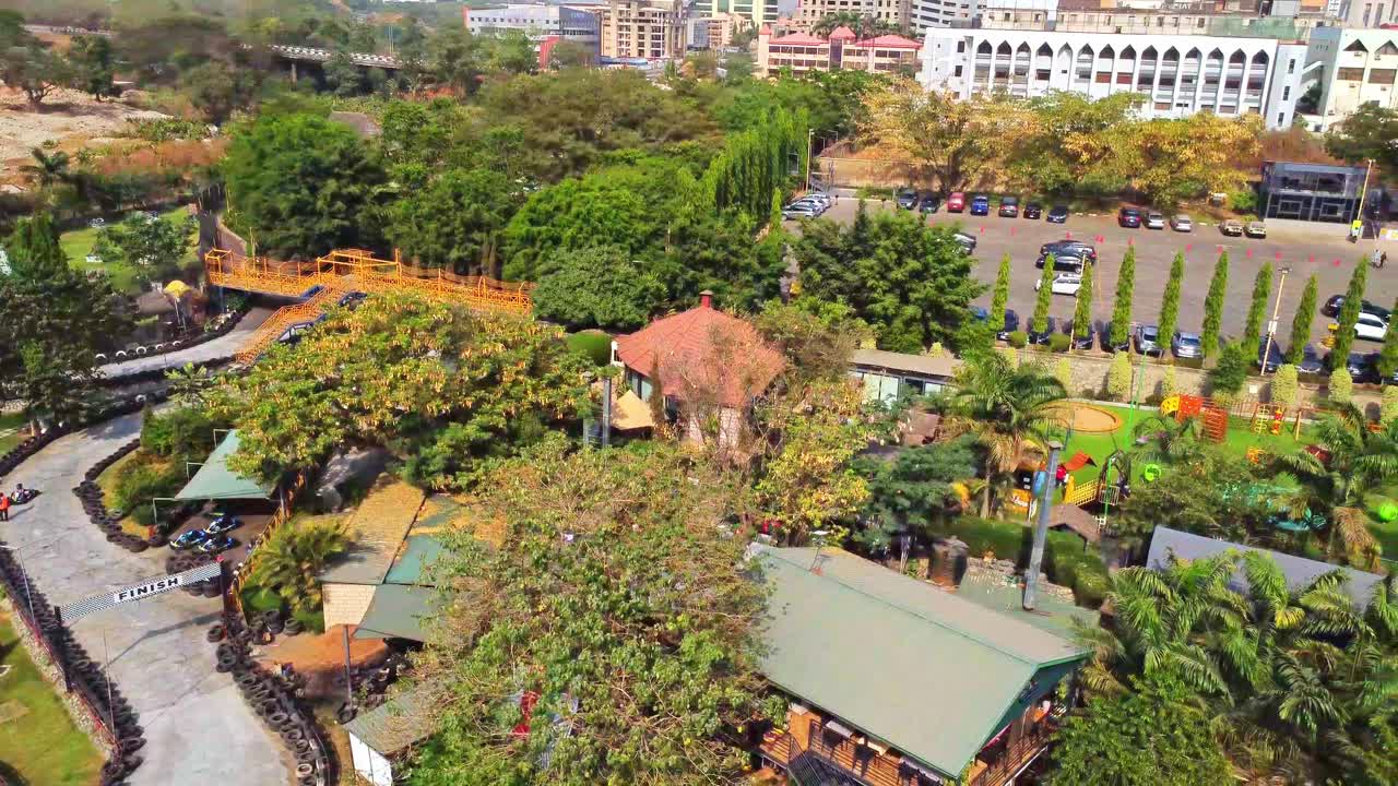 High angle pan of a large playground in the central park of Abuja, Nigeria