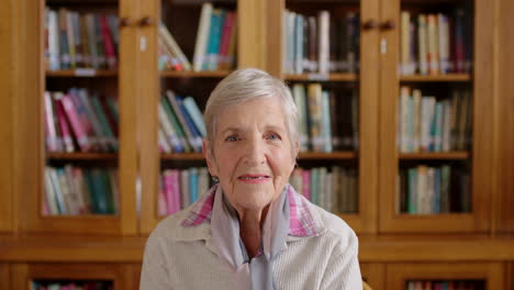 Happy-elderly-woman,-laugh-in-library