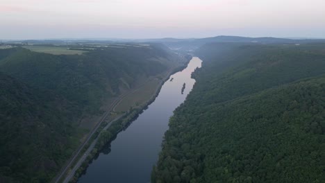 drone flight passing the moselle river in the german rhineland palatinate area near the city of klotten