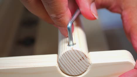 assembling wooden furniture with hand tools