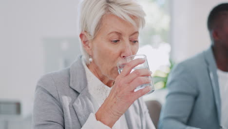 meeting, office and senior woman drinking water
