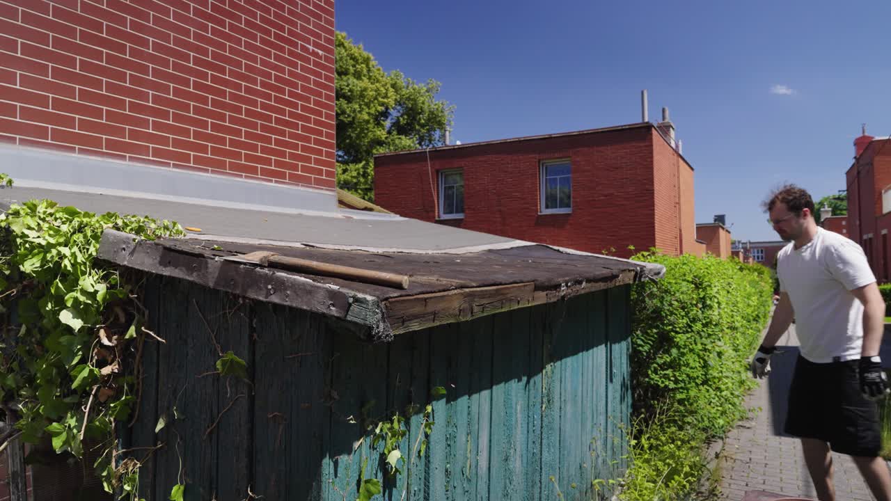 Demolition of a garden house, taking down the roof, part 1