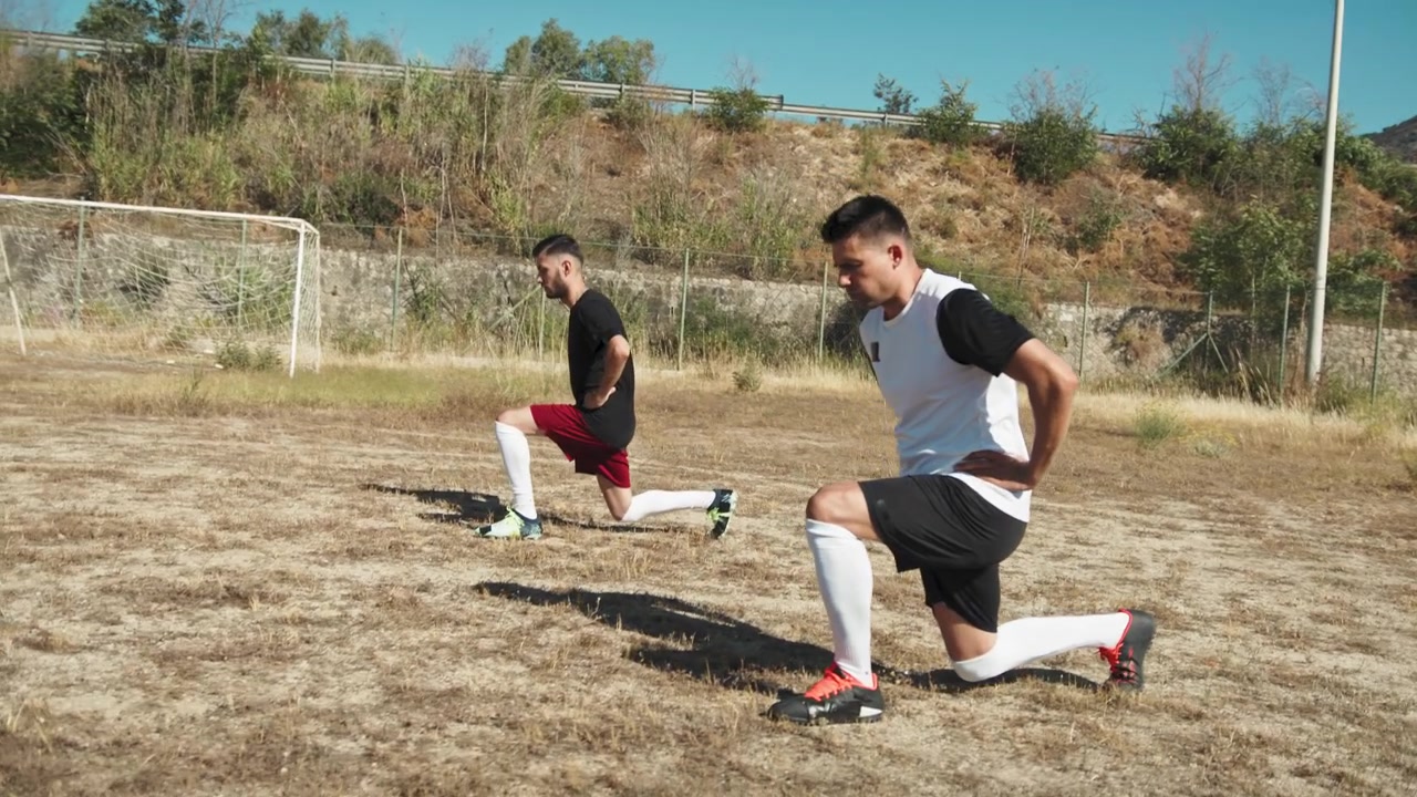 Players Training The Strenght Of The Legs Before The Match