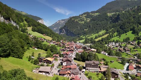 view of a rural residence at the foot of a mountain in lauterbrunnen, switzerland