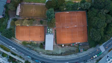 top down view of some soccer and tennis playing fields from a drone