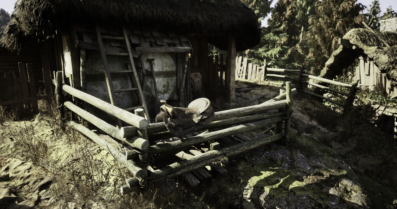Rustic wooden fence and hay covered cottage on a sunny day in nature