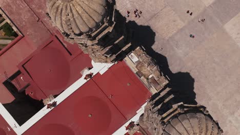 Basilica-of-Our-Lady-of-Zapopan,-Guadalajara,-Mexico,-abstract-drone-zoom-in