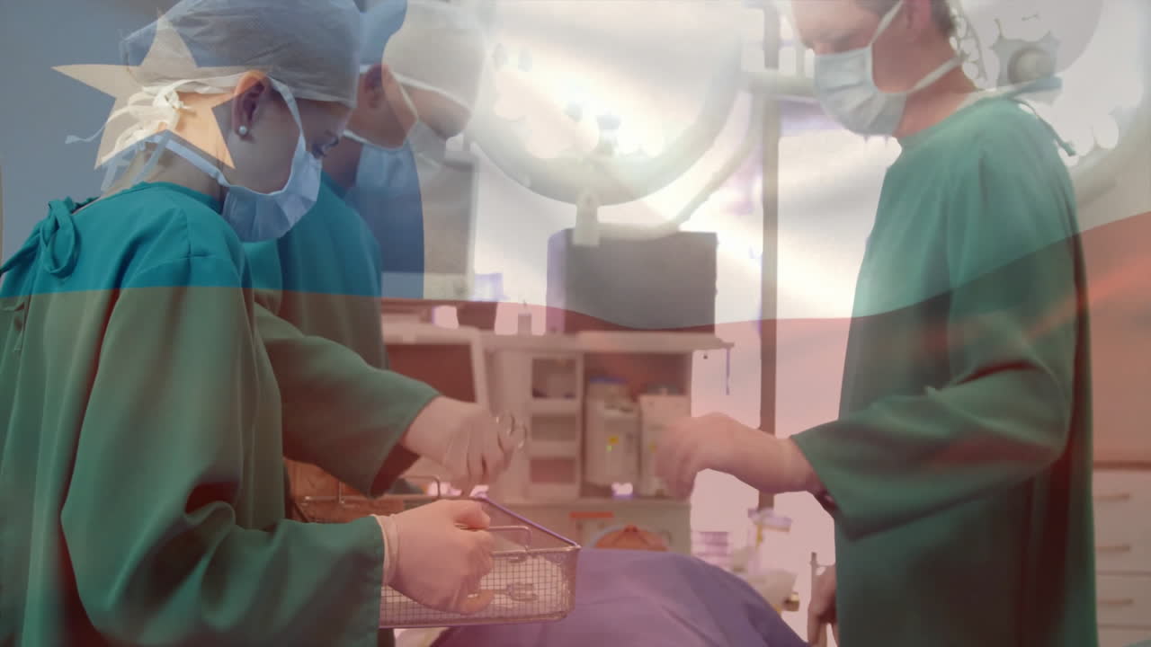 Animation of flag of chile over caucasian surgeons during surgery