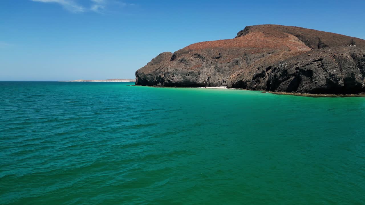 Rock formation by the turquoise waters of La Paz, Tecolandra, Mexico