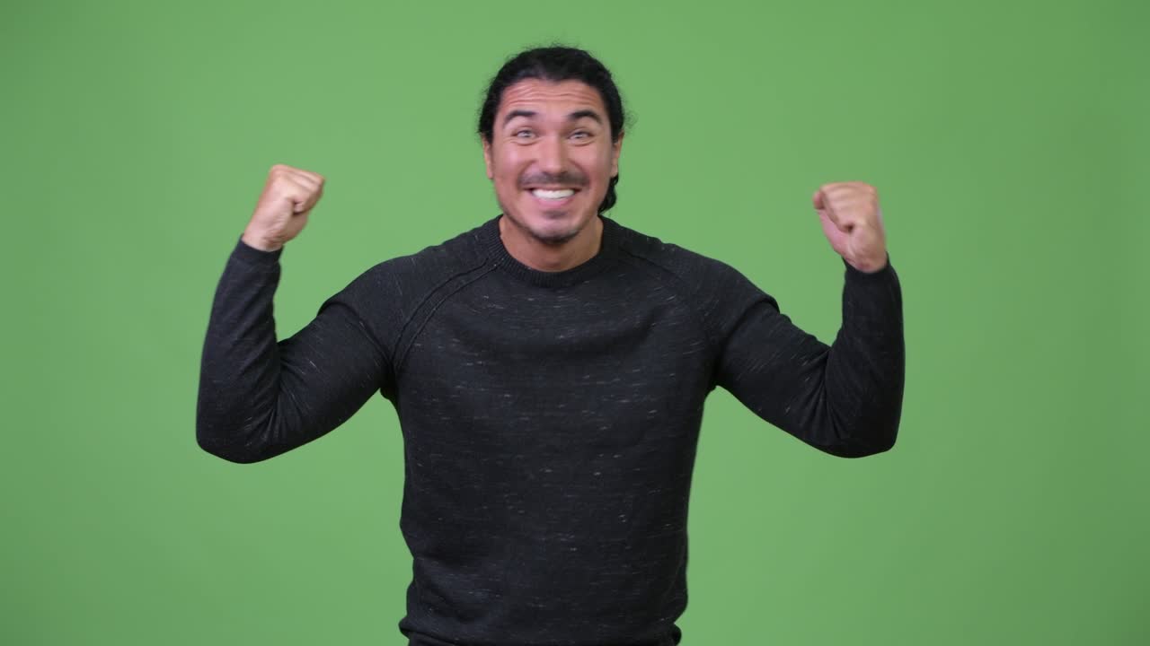 Handsome man looking excited