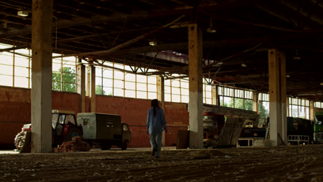 abandoned factory interior with woman
