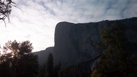 panning shot across silhouetted el capitan rock at low light