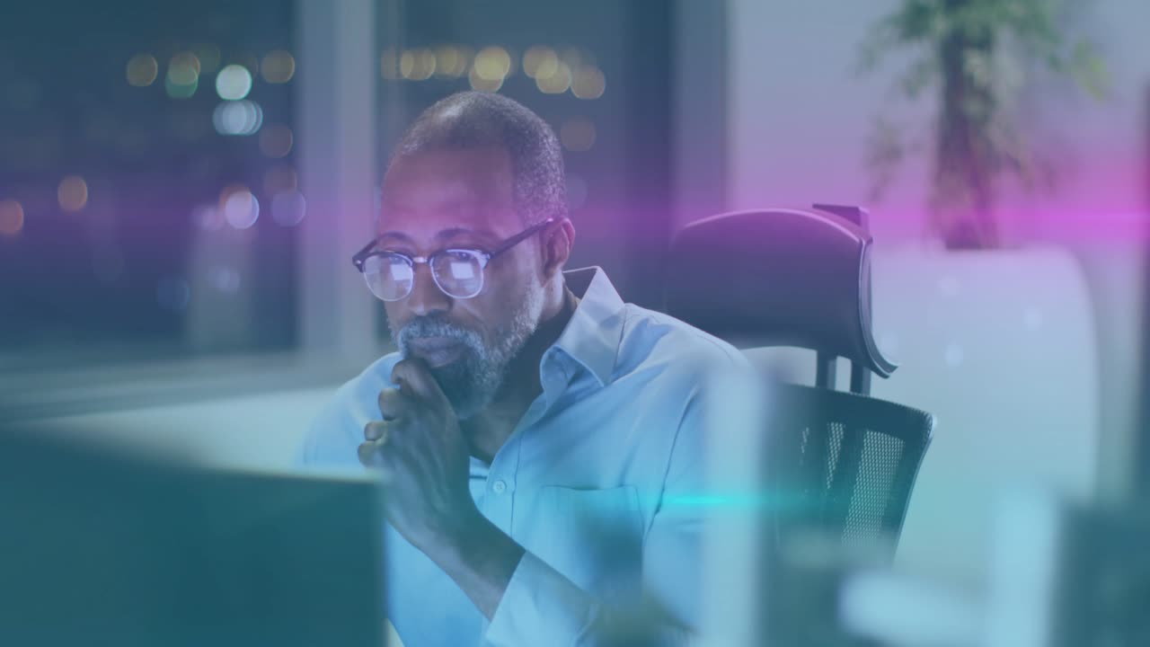 man sitting at desk night, neon lines sweeping into screen, driving focused business data analysis